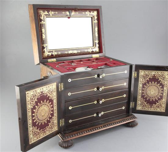 A mid 19th century mother of pearl inlaid rosewood toiletry box, height 13in.